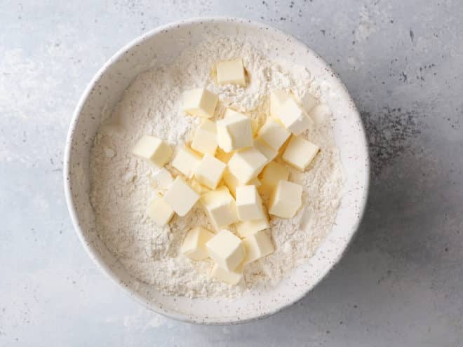 butter in a bowl with dry ingredients