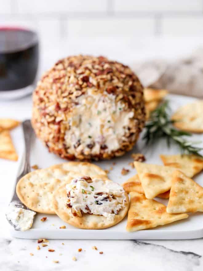a spread of cheeseball on a cracker