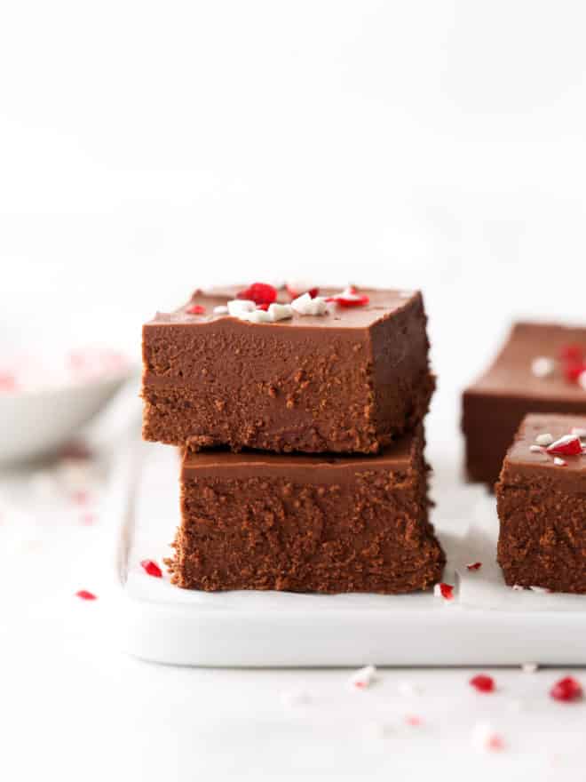 peppermint fudge stacked on a plate