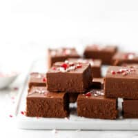 lots of peppermint fudge stacked on a plate