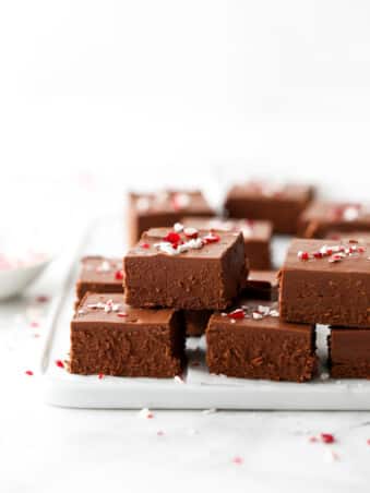 lots of peppermint fudge stacked on a plate