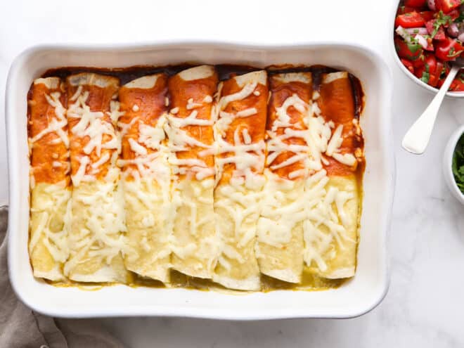 baked red and green chicken enchiladas