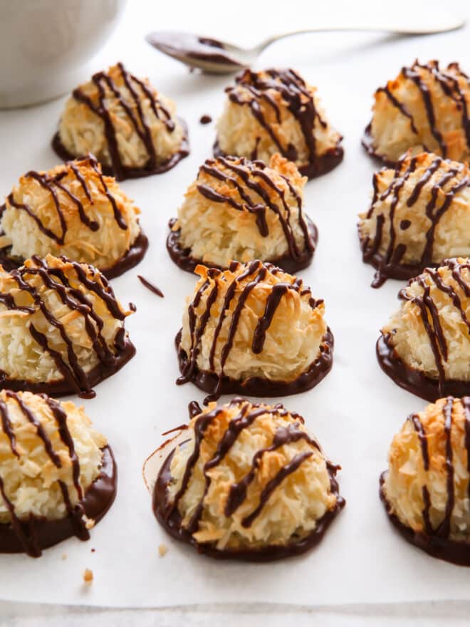 dipping coconut macaroons in chocolate