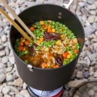 closeup of backpacking ramen in pot over stove