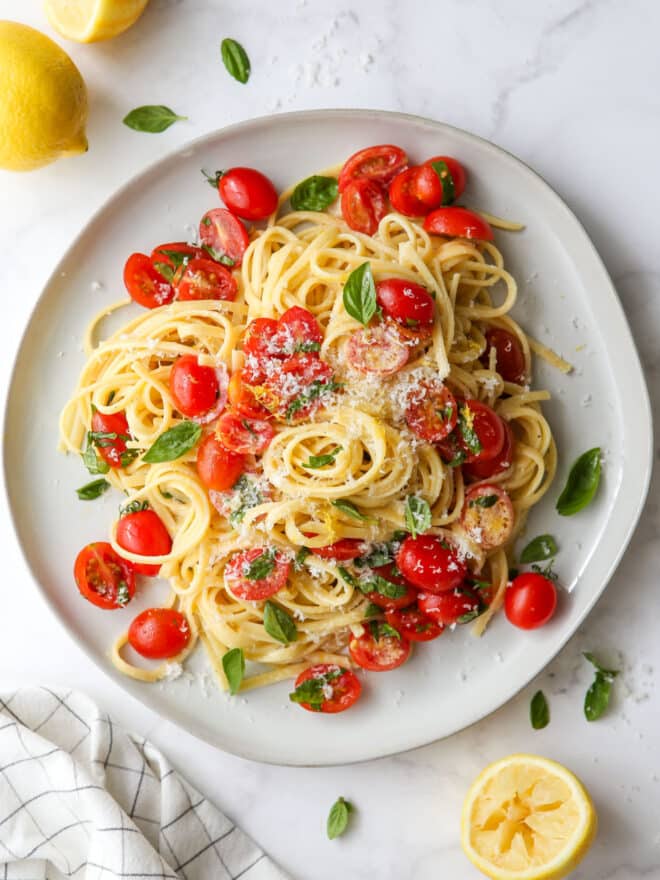 lemon pasta with tomatoes and basil on a plate