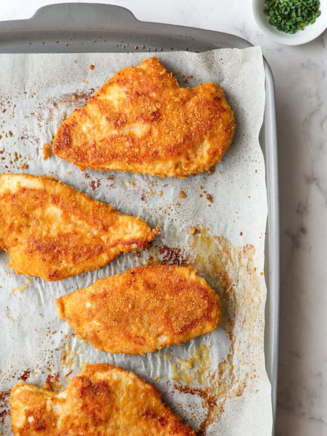 baked oven fried chicken on a sheet pan