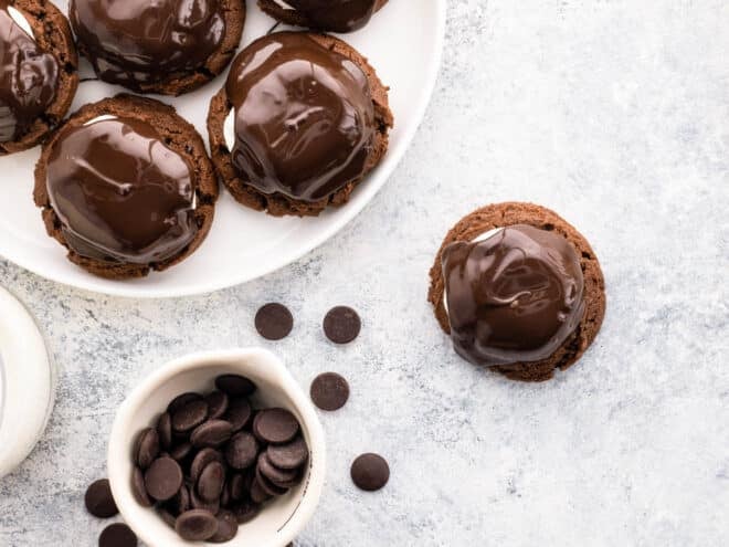 chocolate marshmallow cookies on a plate with chocolate chips
