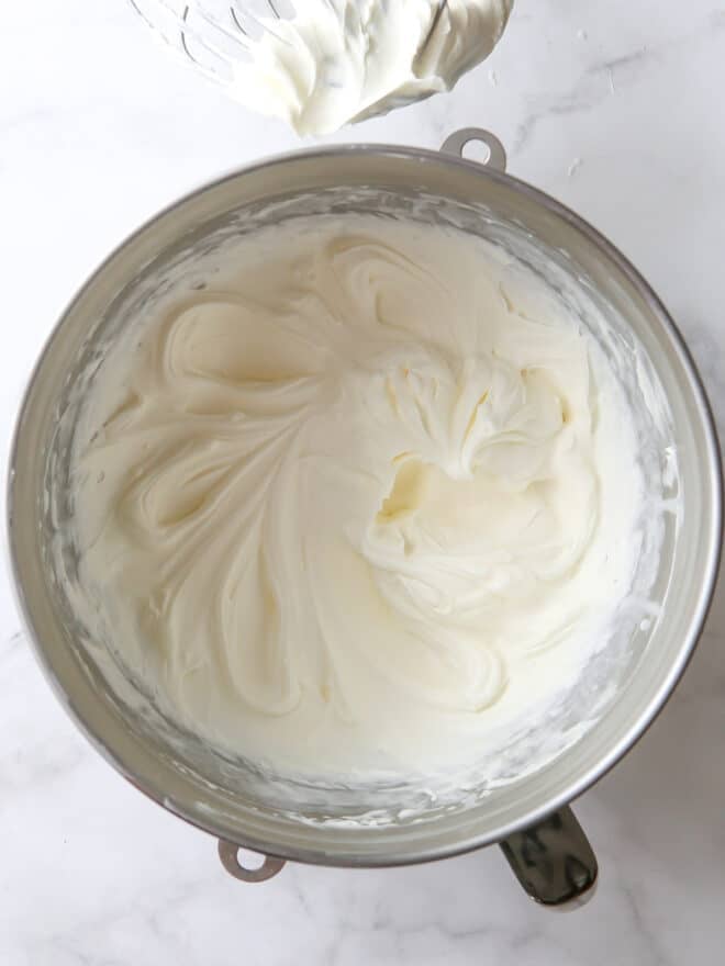 beautiful whipped chantilly cream frosting in a bowl