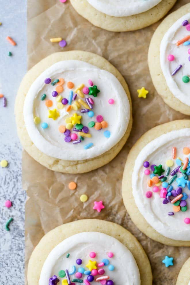 closeup of frosted sugar cookies with sprinkles