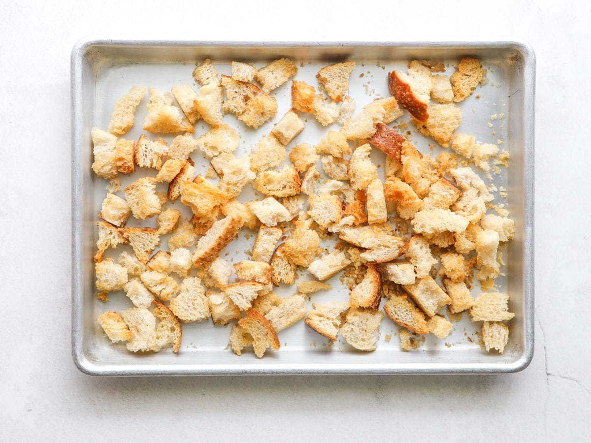 toasted homemade croutons on a sheet pan