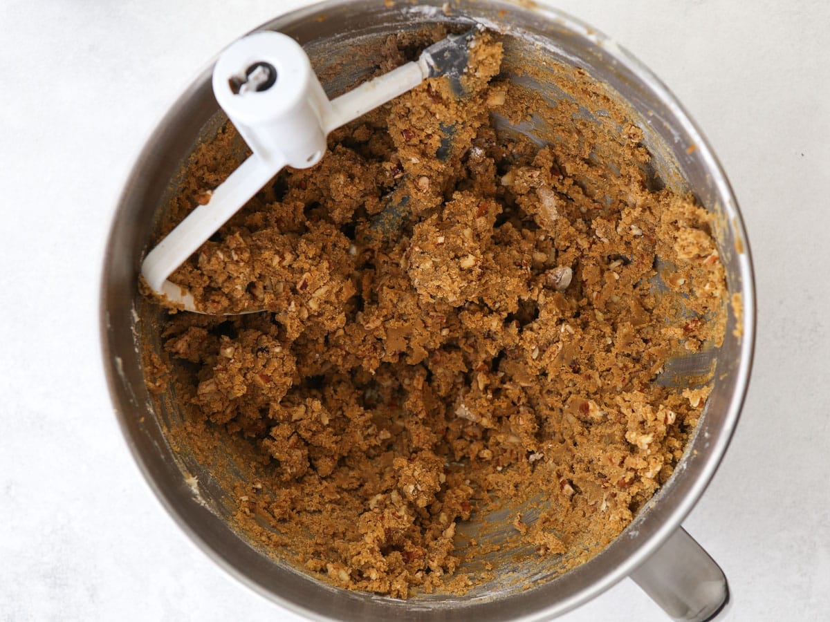 mixed molasses snowball cookie dough in bowl