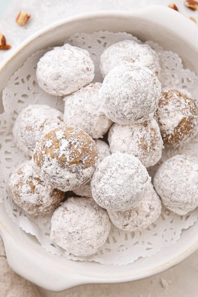bowl of molasses snowball cookies
