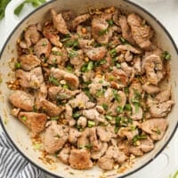 stir-fried thai lemongrass pork in a skillet