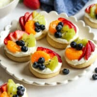 fruit pizza sugar cookies arranged on plate