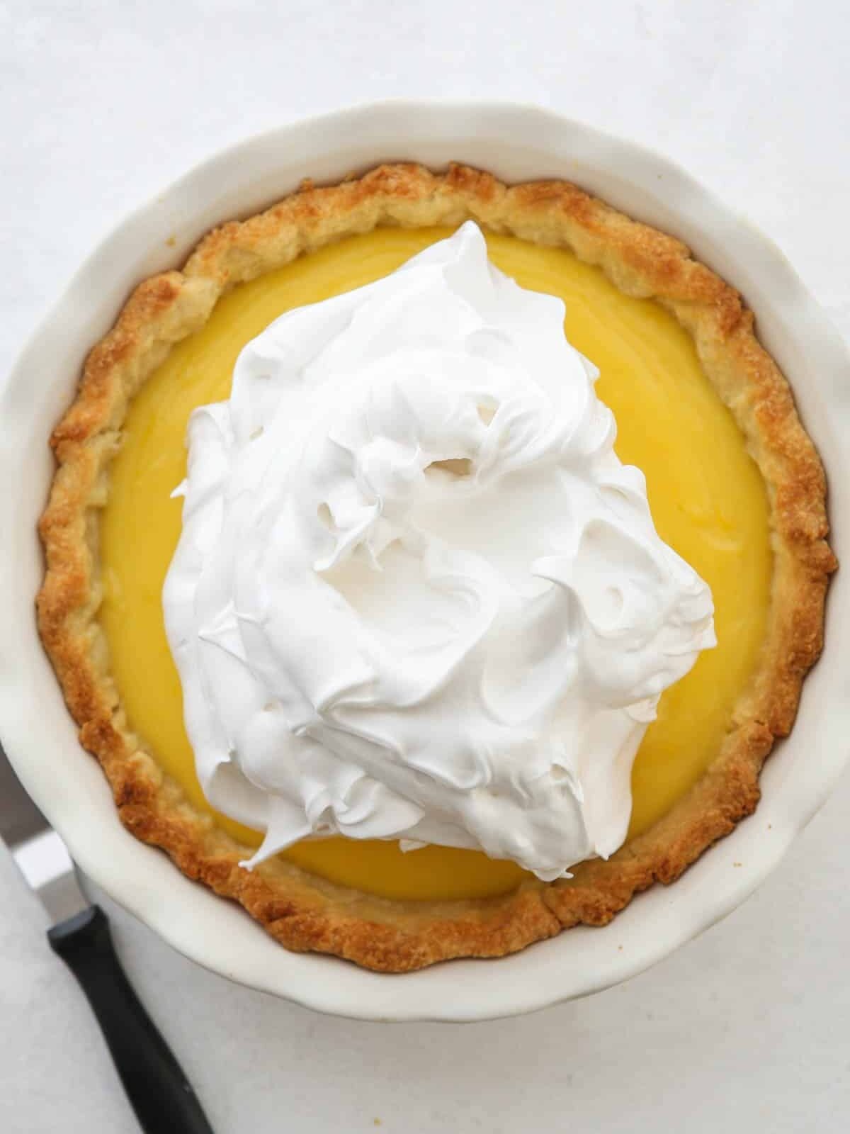 Topping the lemon meringue pie with meringue