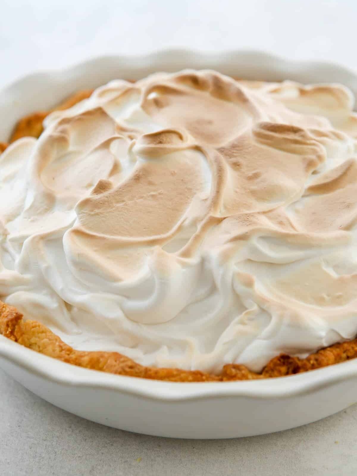 A beautifully toasted and finished lemon meringue pie