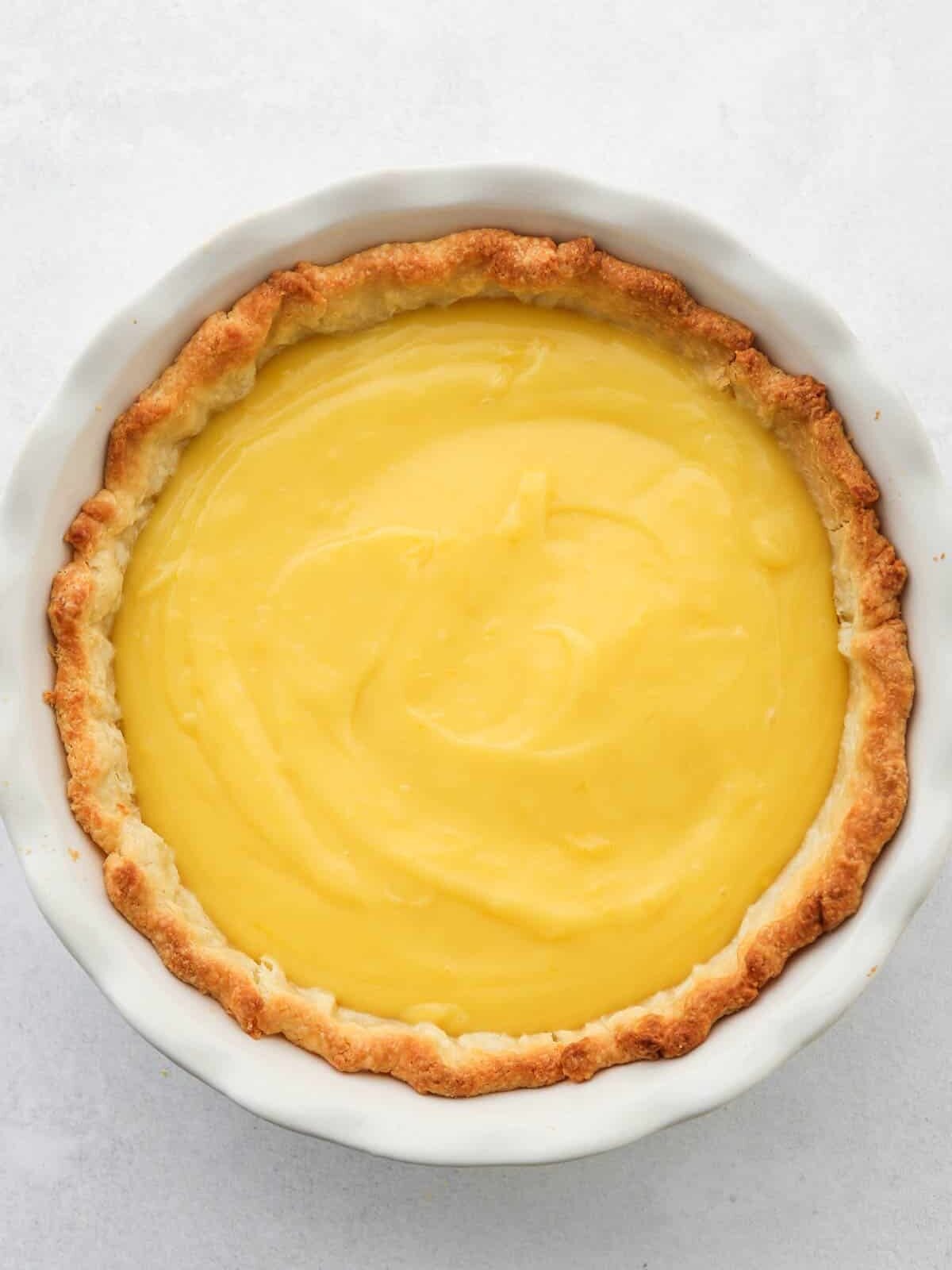 A finished lemon meringue pie in a pie dish